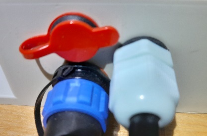 Closed protective cover over the power port